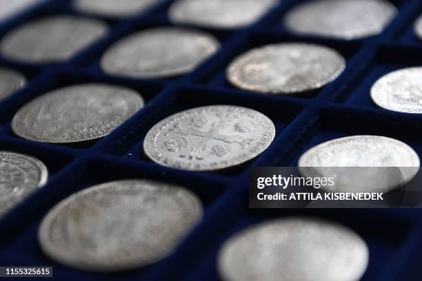 Metal coins of a Holocaust victim's collection are seen on a velvet tray in the Balatoni Museum in the town of Keszthely, 200 km west of Budapest on...