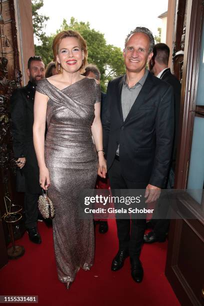 Minister Julia Kloeckner and her husband Ralph Grieser during the opening of the Nibelungen Theatre Festival at St Peter's Cathedral on July 12, 2019...