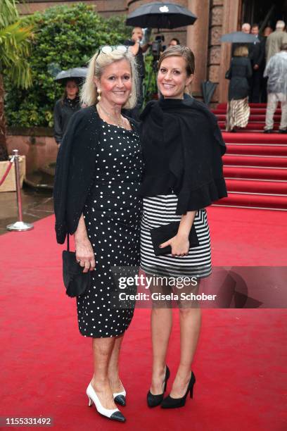 Theresa Underberg and her mother Gabi Underberg during the opening of the Nibelungen Theatre Festival at St Peter's Cathedral on July 12, 2019 in...