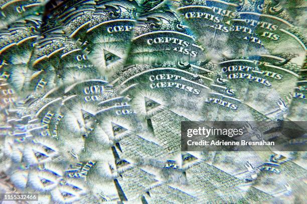 abstract kaleidoscope pattern of the dollar bill pyramid - pyramid with eye stock pictures, royalty-free photos & images