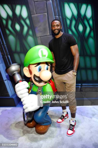 Patrick Patterson visits the Nintendo booth during the 2019 E3 Gaming Convention at the Los Angeles Convention Center on June 11, 2019 in Los...