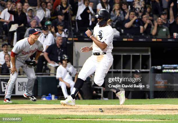 Eloy Jimenez of the Chicago White Sox scores against the Washington Nationals during the sixth inning at Guaranteed Rate Field on June 11, 2019 in...