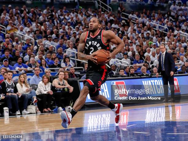 Kawhi Leonard of the Toronto Raptors goes up for a dunk against the Orlando Magic during Game Three of the first round of the 2019 NBA Eastern...
