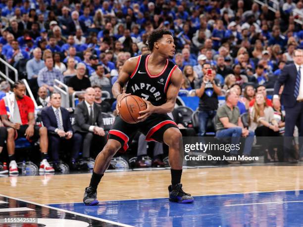 Kyle Lowry of the Toronto Raptors grabs a rebound against the Orlando Magic during Game Three of the first round of the 2019 NBA Eastern Conference...