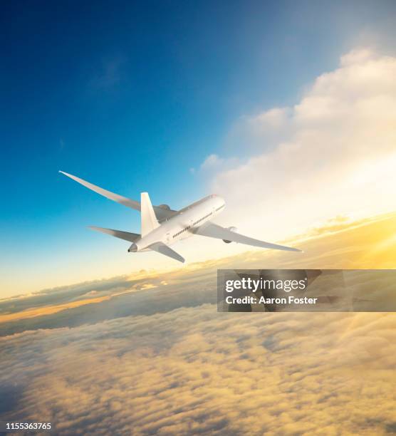 gerneric aircraft in flight - aircraft planes aaron foster stock pictures, royalty-free photos & images