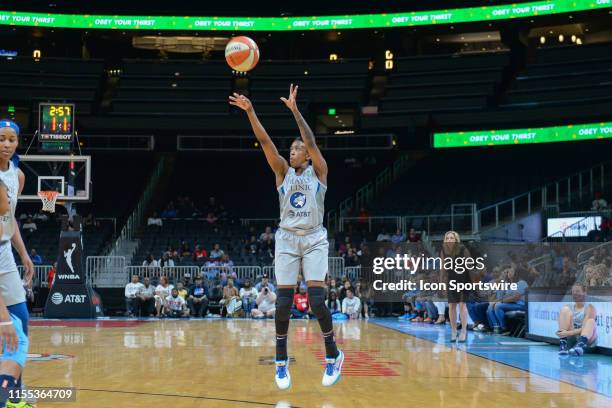 Minnesota's Danielle Robinson shoots a three pointer during the WNBA game between the Minnesota Lynx and the Atlanta Dream on July 12th, 2019 at...
