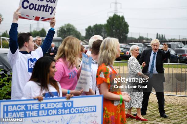 Boris Johnson greets Conservative MP Nadine Dorries and supporters before the Conservative leadership hustings on July 13, 2019 in Wyboston, England....