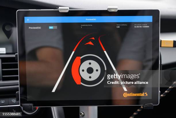 July 2019, Lower Saxony, Hanover: In a car with a brake assistant from the technology company Continental, an automatic braking process is displayed...