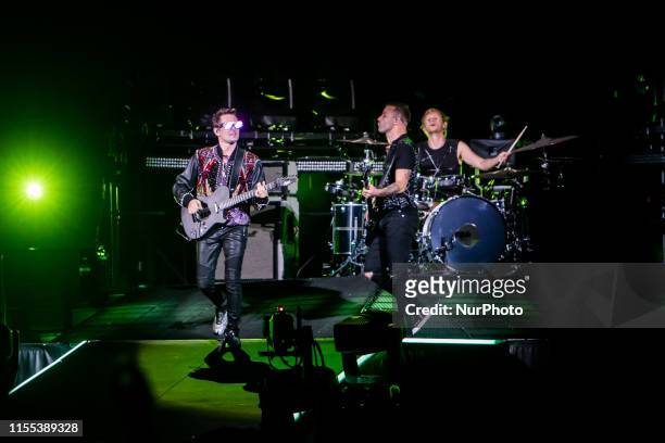 Matthew Bellamy , Chris Wolstenholme and Dominic Howard of Muse performs live at Stadio San Siro in Milano, Italy, on July 12 2019