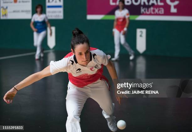 Iera Jaka returns the ball during the San Fermin women's Basque pelota championship final match at the Fronton Labrit on the sidelines of the San...