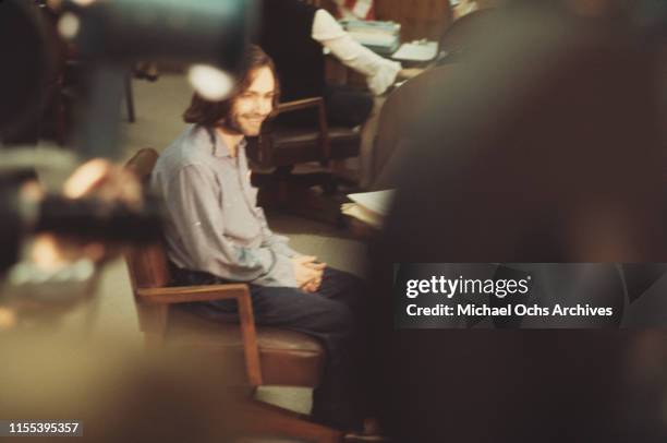 American criminal and cult leader Charles Manson sits at the defendant's table at the Santa Monica Courthouse for a hearing regarding the murder of...