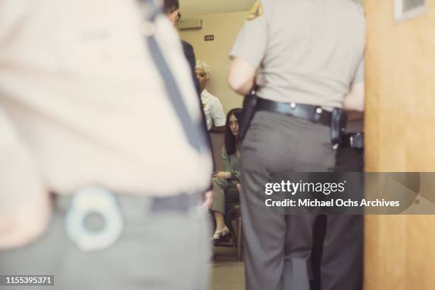 American murderer and member of the Manson Family Susan Atkins sits outside a court room at the Santa Monica Courthouse waiting for her hearing...