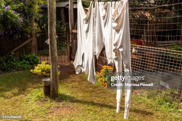 https://media.gettyimages.com/id/1155396630/photo/old-fashioned-underwear-hangs-on-a-washing-line-in-a-garden.jpg?s=612x612&w=gi&k=20&c=k7CdXn9UDpU_WR9_2pN_uPcmzlUNHumnWkk3_NNMfcg=