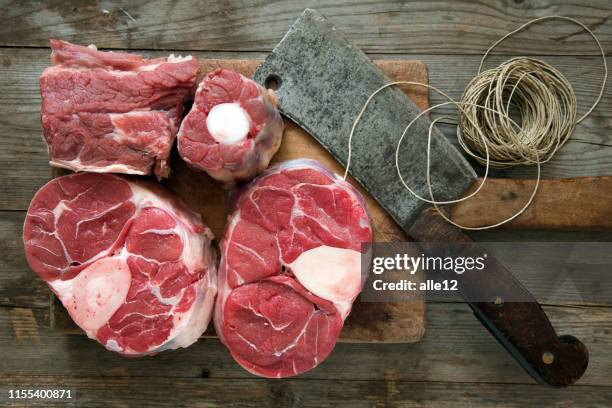 beef on cutting board - osso buco stock pictures, royalty-free photos & images