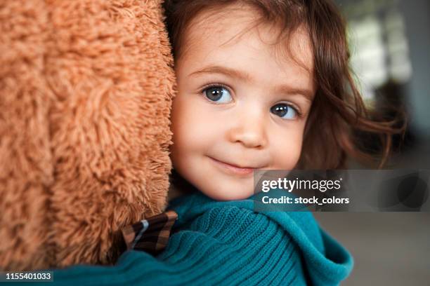 älskar min leksak - baby stuffed animal bildbanksfoton och bilder