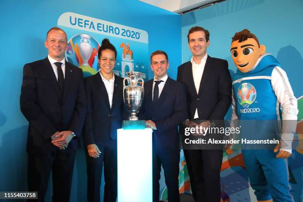 Marcus Stenger, Philipp Lahm, Celia Sasic, Friedrich Curtius and Skillzy pose with the EURO Championships Winner trophy at the EURO-Countdown: 2020 -...