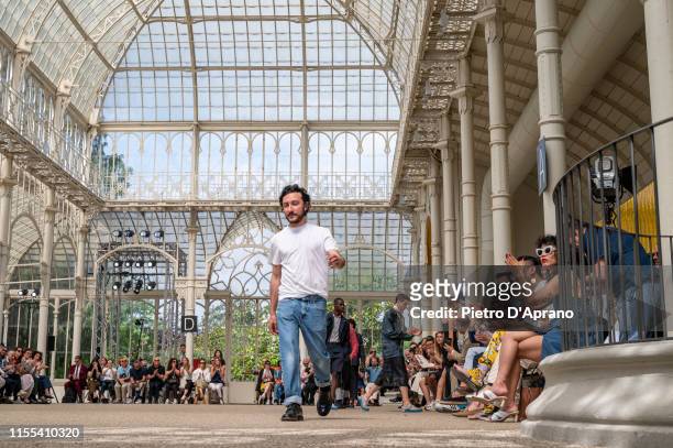Italian Designer Marco de Vincenzo acknowledges the applause of the public after the Marco De Vincenzo fashion show during Pitti Immagine Uomo 96 on...