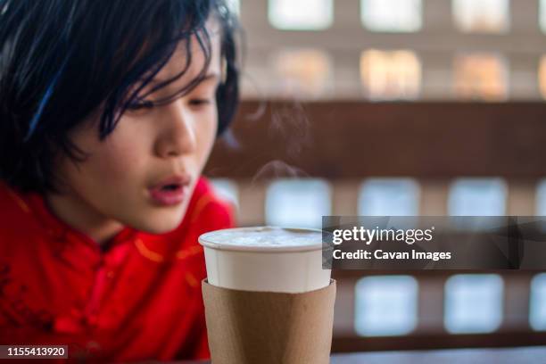 Blowing Cup Photos and Premium High Res Pictures - Getty Images