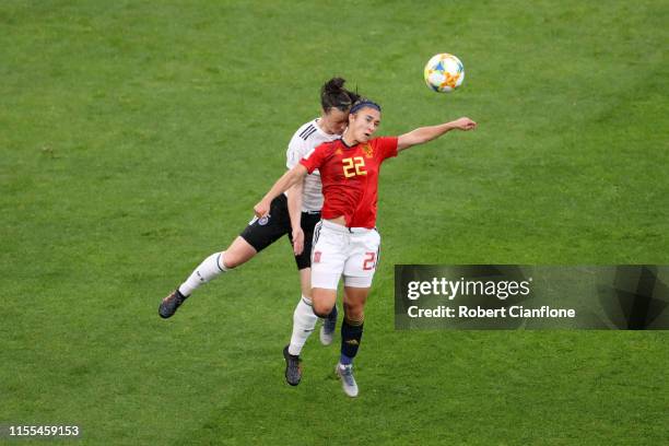 Marina Hegering of Germany competes for a header with Nahikari Garcia of Spain during the 2019 FIFA Women's World Cup France group B match between...
