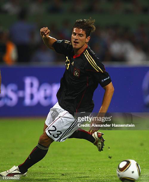 Mario Gomez of Germany runs with the ball during the UEFA EURO 2012 qualifying match between Azerbaijan against Germany at Tofig-Bahramov-Stadium on...