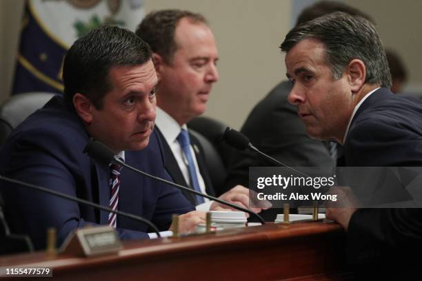 Ranking member Rep. Devin Nunes listens to Rep. John Ratcliffe during a hearing before the House Intelligence Committee June 12, 2019 on Capitol Hill...