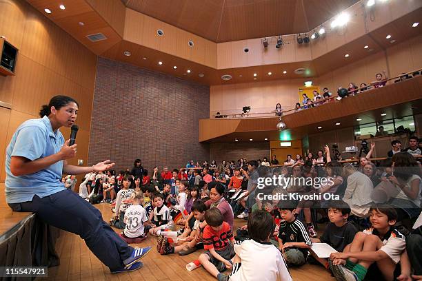 Steffi Jones , President of the Women's World Cup 2011 German Organizing Committee, speaks in front of students as she visits Deutsche Schule Tokyo...