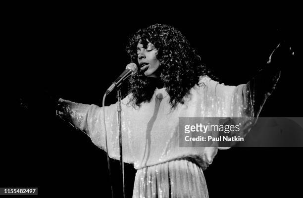 American Disco and R&B singer Donna Summer performs onstage at the Poplar Creek Music Theater, Hoffman Estates, Illinois, July 12, 1983.