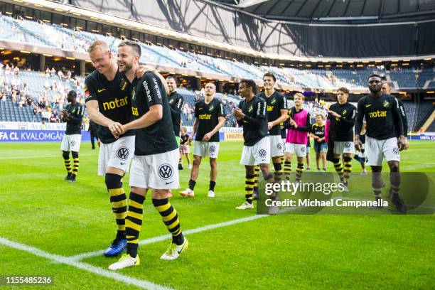 Robert Lundstrom and Kolbeinn Sigþorsson of AIK celebrate with teammates after an Allsvenskan match between AIK and IF Elfsborg at Friends Arena on...