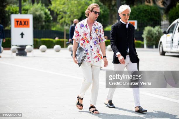 Guests seen during Pitti Immagine Uomo 96 on June 12, 2019 in Florence, Italy.