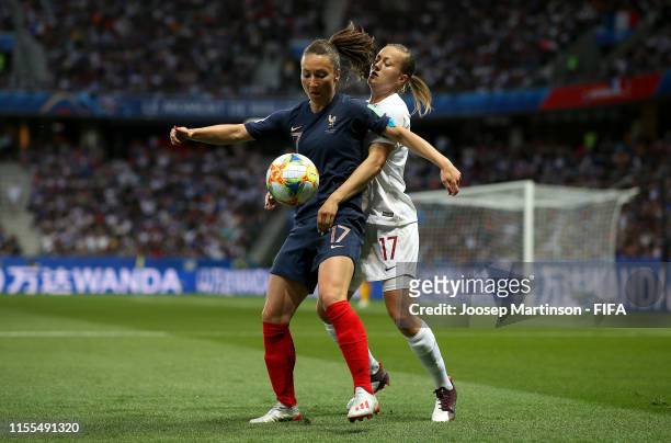 Gaetane Thiney of France is challenged by Kristine Minde of Norway during the 2019 FIFA Women's World Cup France group A match between France and...