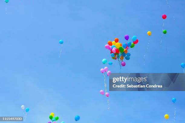 colorful balloons in the sky, lifestyle. - balloons in sky stock pictures, royalty-free photos & images