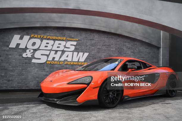 McLaren 600LT supercar is part of the atmosphere at the world premiere of "Fast & Furious presents Hobbs & Shaw," at the Dolby Theatre in Hollywood...