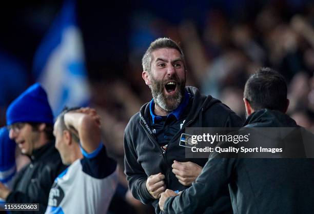 Fan of Deportivo de La Coruna celebrates after Borja Valle of Deportivo de La Coruna scores his team's fourth goal during the La Liga 123 play off...