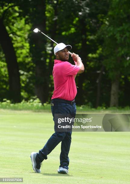 Harold Varner III hits his approach shot on the hole during the third round of the John Deere Classic Golf Tournament at TPC Deere Run on July 13 at...