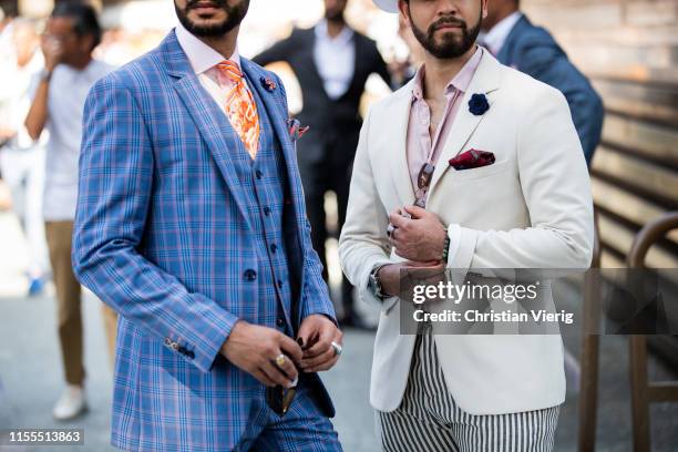 Guests seen wearing pocket square during Pitti Immagine Uomo 96 on June 12, 2019 in Florence, Italy.