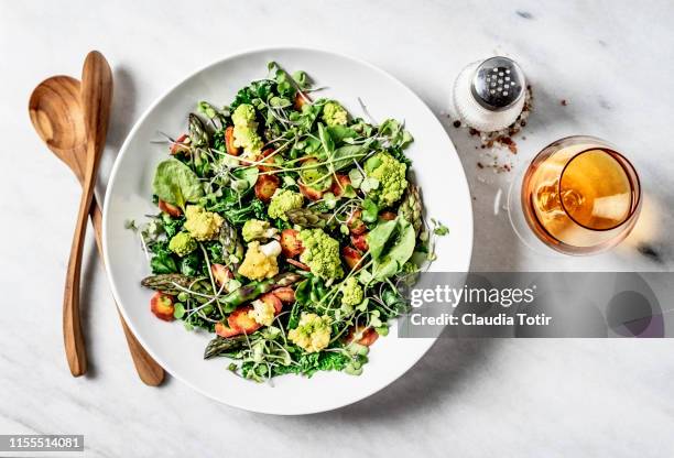 a bowl of fresh salad on white background - watercress stock pictures, royalty-free photos & images