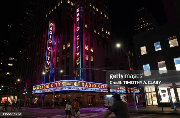 Radio City Music Hall facade is pictured after the lights came back on after a major power outage affected parts of New York City on July 13, 2019....