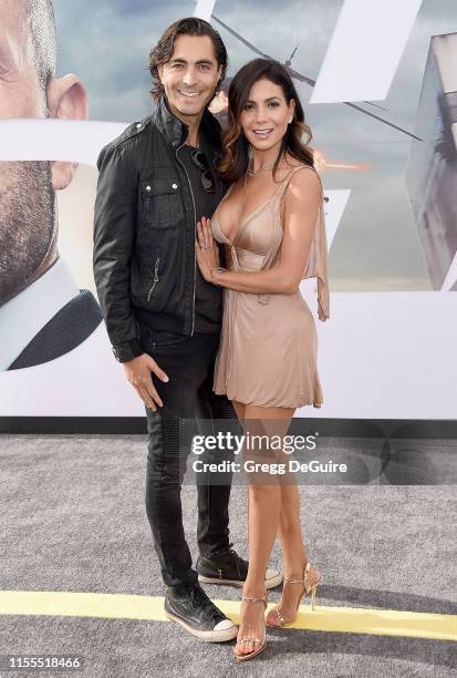 Forrest Kolb and Patricia Manterola arrive at the Premiere Of Universal Pictures' "Fast & Furious Presents: Hobbs & Shaw" at Dolby Theatre on July...