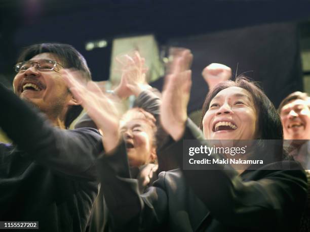 they are standing ovation with smile - encouragement stock pictures, royalty-free photos & images