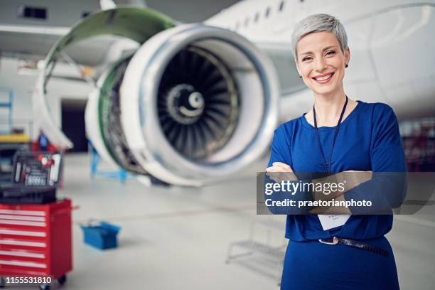 portrait of airplane hangar manager - aircraft engineer stock pictures, royalty-free photos & images