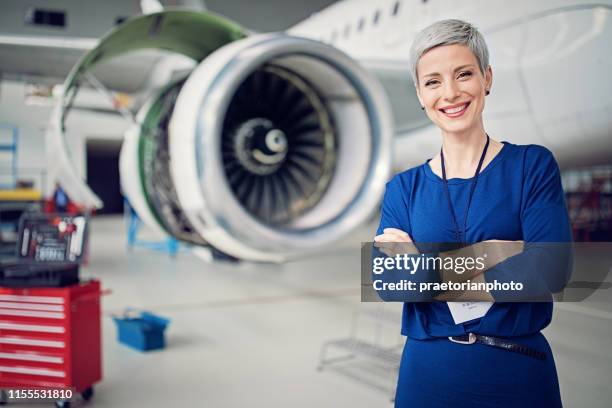 portrait of airplane hangar manager - aircraft maintenance stock pictures, royalty-free photos & images