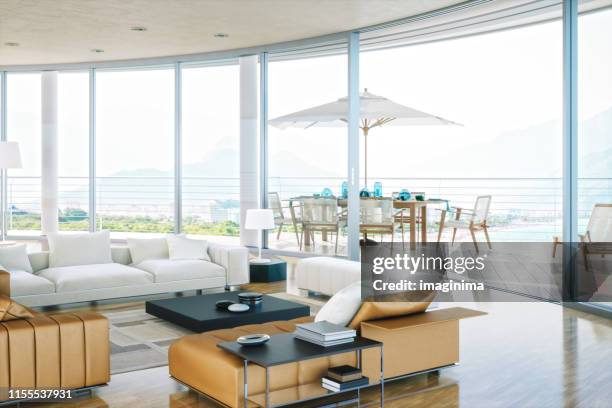 luxury rooftop living room with ocean view - penthouse stock pictures, royalty-free photos & images