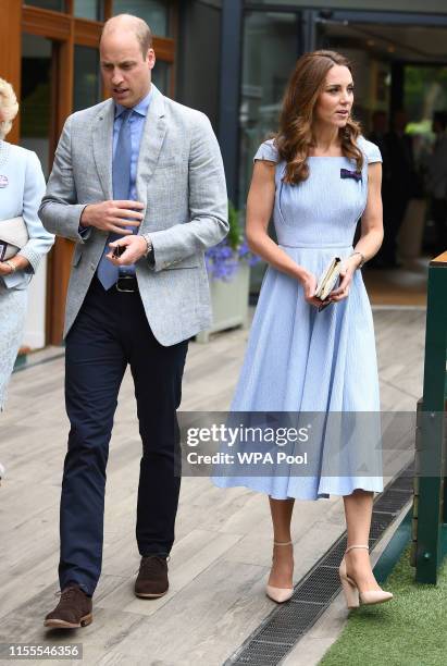 Catherine, Duchess of Cambridge and Prince William, Duke of Cambridge arrive ahead of the Men's Singles Final on day thirteen of the Wimbledon...