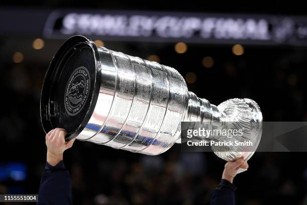 The Stanley cup is hoisted after the St. Louis Blues defeated Boston Bruins in Game Seven of the 2019 NHL Stanley Cup Final at TD Garden on June 12,...