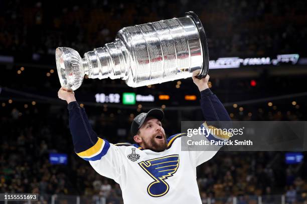 David Perron of the St. Louis Blues celebrates with the Stanley cup after defeating the Boston Bruins in Game Seven of the 2019 NHL Stanley Cup Final...