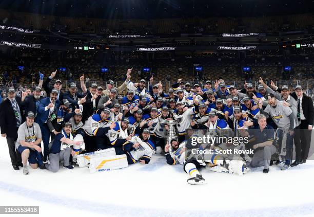 The St. Louis Blues pose for a photo with the Stanley Cup after the 2019 NHL Stanley Cup Final at TD Garden on June 12, 2019 in Boston,...