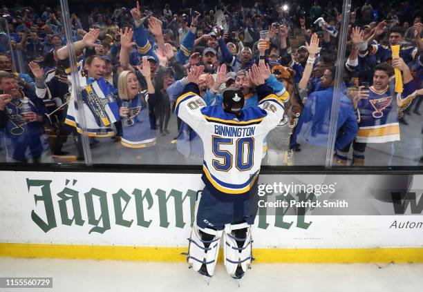 Jordan Binnington of the St. Louis Blues celebrates with the fans after defeating the Boston Bruins in Game Seven of the 2019 NHL Stanley Cup Final...