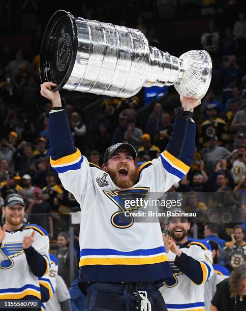 Ryan O'Reilly of the St Louis Blues celebrates with the Stanley Cup after beating the Boston Bruins in Game Seven of the Stanley Cup Final at the TD...