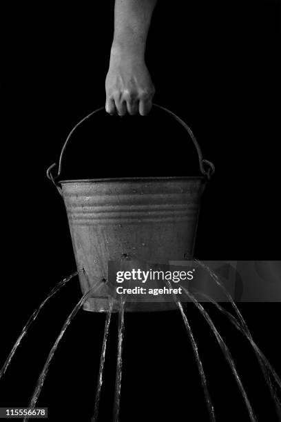 in vain - bucket stock pictures, royalty-free photos & images