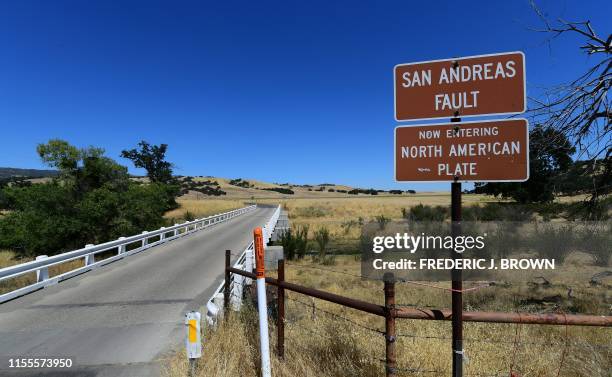 Bridge crosses over the San Andreas Fault from the Pacific to the North American tectonic plates near Parkfield, California on July 12, 2019 in a...